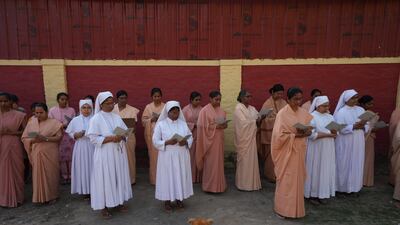 Christians mark Good Friday outside St Joseph's Cathedral, in Prayagraj, in the northern Indian state of Uttar Pradesh. AP