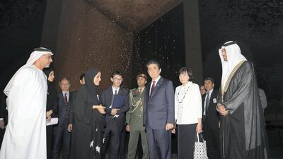 Mr Abe visits the Founder's Memorial with Dr Al Jaber. The Japanese prime minister will also hold talks on his trip with Sheikh Mohammed bin Zayed, the Crown Prince of Abu Dhabi, and will participate in an economic forum focused on diversification and innovation in the UAE. Pawan Singh / The National