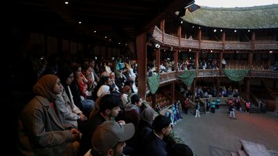 People attend an Open Iftar 2025 event organised by the Ramadan Tent Project at Shakespeare's Globe in London. Reuters
