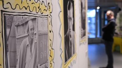 A picture of author Roald Dahl, left, is seen on display at the renovated Roald Dahl Museum and Story Centre in Great Missenden, London. AFP