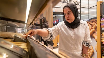 In the mornings, Ms Ebrahim patrols the shop floor to make sure everything has been restocked correctly from the daily delivery