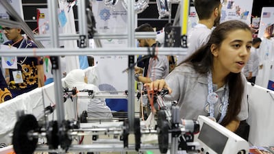 Amneh Kabobur from Hope (Refugees) team explains about their robot.