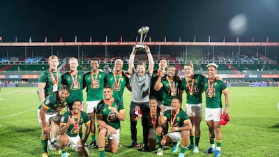 South Africa celebrate after winning the World Series Men’s final at Dubai Sevens against Argentina.