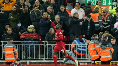 Liverpool's Sadio Mane celebrates after scoring his side's opening goal. AP