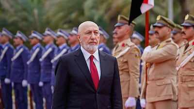 Iraq’s new President Nizar Amedi inspecting a guard of honour during his ceremonial reception at the Peace Palace in Baghdad. AFP
