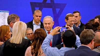 Israeli Prime Minister Benjamin Netanyahu meets with people after giving a statement. AFP