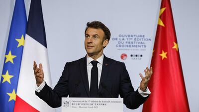 Mr Macron delivers a speech at the Red Brick Museum. AFP