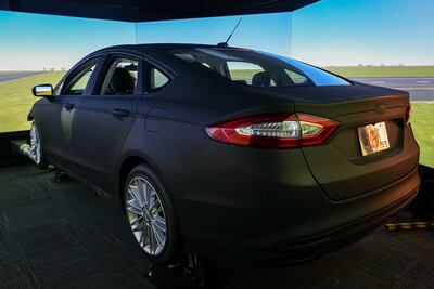 Georgia Tech's Autonomous and Connected Transportation Laboratory features a Ford Fusion simulator, along with a 360-degree view of a virtual environment.