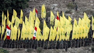 Hizbollah militia members listening to the speech of their leader Hassan Nasrallah via a giant screen on August 14, 2015, during the 'Victory Festival' to mark the 9th anniversary of the end of the 2006 July War between Hizbollah and Israel in Wadi Al Hujeir area, southern Lebanon. EPA
