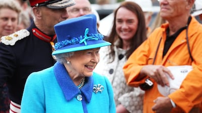 Queen Elizabeth II greets crowds of well-wishers in Scotland as they mark her becoming Britain’s longest-reigning monarch, a title previously held by Queen Victoria. Andrew Milligan / Getty Images
