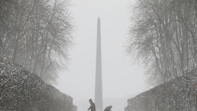 Workers remove snow during a heavy snowfall in Kiev, Ukraine. Valentyn Ogirenko / Reuters