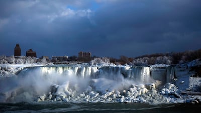 Water flows over the American Falls. Aaron Lynett / The Canadian Press via AP
