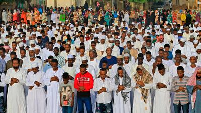 Muslim worshippers gather for Eid Al Fitr prayers in the district of Jureif Gharb of Sudan's capital Khartoum AFP