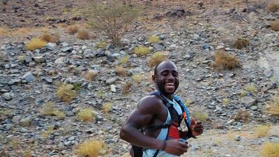 Souleymane Ghani takes on the hills near Hatta on Sunday afternoon, a few hours into his run.