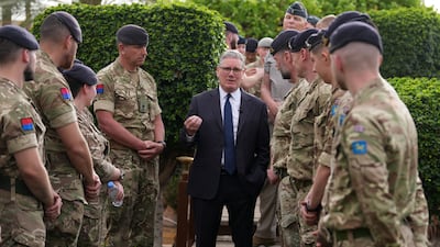 Britain's Prime Minister Keir Starmer meets air crew members during a visit to Taif Airbase in Saudi Arabia. Getty Images