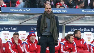 Bayern Munich manager Pep Guardiola observes his side during their Bundesliga win over Stuttgart on Saturday. Daniel Roland / AFP / February 7, 2015