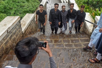 Youngsters record a video for TikTok in Mumbai in 2019. The app was banned in India the following year. AFP
