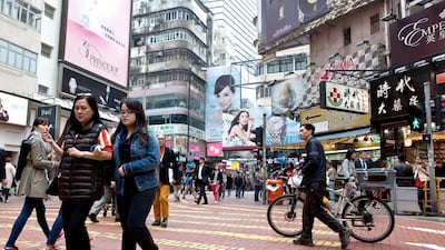 9. Hong Kong international tourists will spend an aggregate $8.30 billion this year. Anthony Wallace / AFP