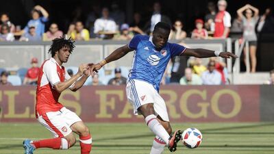 MLS All-Stars’ Didier Drogba, right, of the Montreal Impact, scores next to Arsenal’s Mohamed Elneny during the first half of the MLS All-Star game Thursday, July 28, 2016, in San Jose, California. Marcio Jose Sanchez / AP Photo