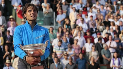 10) Rafael Nadal reaches 10 Grand Slam titles with his sixth Roland Garros triumph at the 2011 French Open. AFP