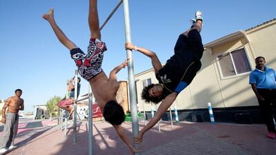 Kids pose for a picture on the Kite Beach in Umm Suqueim area of Dubai. Jaime Puebla / The National