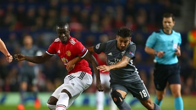 Manchester United's Eric Bailly, left, is settling in well, he says, to life at Old Trafford with Manchester United. Dave Thompson / AP Photo