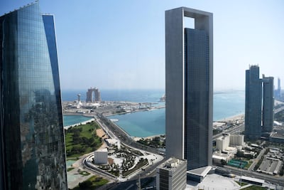 A view of the seafront promenade and Adnoc headquarters along the Corniche in Abu Dhabi. AFP
