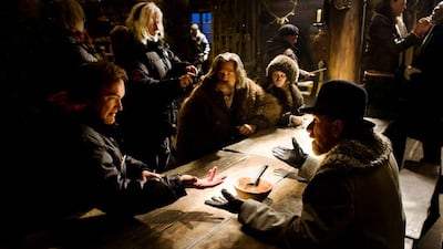 The Hateful Eight takes place mostly in a single location. From left to right, director Quentin Tarantino, Kurt Russell, Jennifer Jason Leigh and Tim Roth on the set of the film. Andrew Cooper, SMPSP / The Weinstein Company