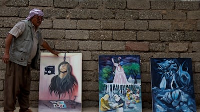 Some of his paintings depict what a UN-appointed commission of independent war crimes investigators said was genocide against the Yazidis