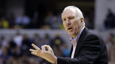 San Antonio Spurs head coach Gregg Popovich looks for a three second violation call from the referee in the first half against the Indiana Pacers on Monday night. Michael Conroy / AP / April 1, 2014