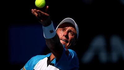 Lleyton Hewitt of Australia serves in his first round match against Andreas Seppi of Italy. Clive Brunskill / Getty Images