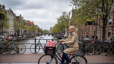 Dutch authorities are stepping up efforts to woo firms and their employees to cities such as Amsterdam after the UK leaves the EU. AFP