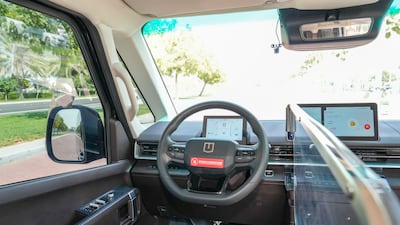 A barrier is installed to the right of the 'driving' seat to protect the vehicle from tampering