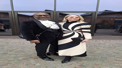 A velvet suit and cravat and monochrome swirled Gucci dress, spotted on the street