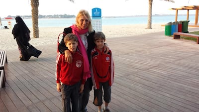 Ibolya Ryan and her twin 11-year-old sons. Courtesy Footprints Recruiting