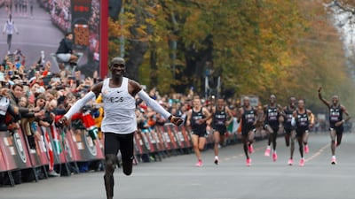 Kenya's Eliud Kipchoge, the marathon world record holder, crosses the finish line during his attempt to run a marathon in under two hours in Vienna, Austria. REUTERS