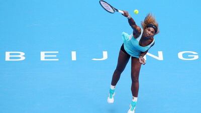 Serena Williams of the US serves during her first round victory over Silvia Soler-Espinosa at the China Open on Monday in Beijing. Chris Hyde / Getty Images / September 29, 2014