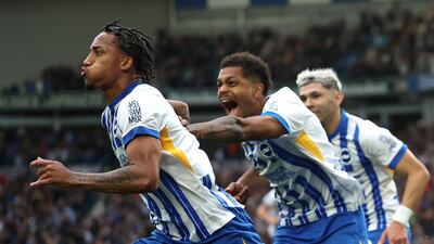 Joao Pedro of Brighton & Hove Albion celebrates scoring the winner with teammates. Getty Images