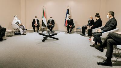French President Emmanuel Macron, center right, Sudan's Prime Minister Prime Minister of Sudan Abdallah Hamdok, center left, and Gen. Abdel-Fattah Burhan, head of Sudan's ruling sovereign council attend an international conference on Sudan in Paris. AP Photo