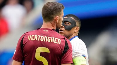 Tempers flare between France's Kylian Mbappe and Belgium's Jan Vertonghen. PA