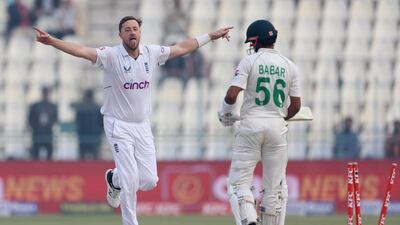 England's Ollie Robinson celebrates after bowling Babar Azam of Pakistan. Getty