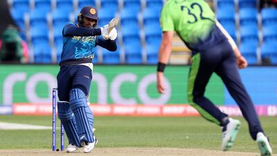 Dhananjaya de Silva plays a shot off the bowling of Ireland's Mark Adair. AFP