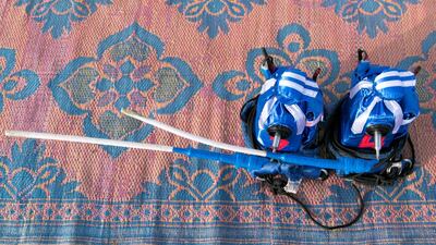 Robot jockeys at Al Marmoum Camel Race Track.