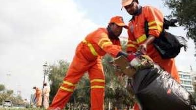 A group of 50 cleaners was assigned to pick up litter and empty rubbish bins on Abu Dhabi's Corniche after National Day.