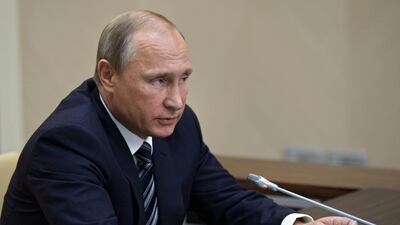 Russian President Vladimir Putin holds a meeting with senior government officials at the Novo-Ogaryovo residence outside Moscow, Russia. Alexei Nikolsky / AP Photo