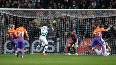 Celtic’s Moussa Dembele, centre, scores the first goal against Manchester City. Robert Perry / EPA
