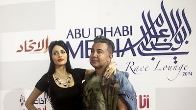 Guests attend the Abu Dhabi Media Racing Lounge and yacht in Yas Marina during the Etihad Airways Formula One Abu Dhabi Grand Prix.