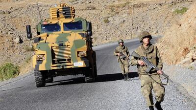 Turkish soldiers patrol a road near Cukurca in the Hakkari province, southeastern Turkey, near the Turkish-Iraqi border. Reuters