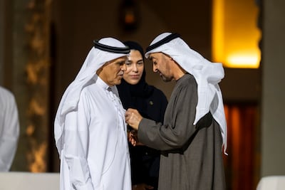President Sheikh Mohamed with Abdulla Mohamed Ibrahim Obaidalla, who received the award of behalf of his late father Mohamed Ibrahim Obaidullah. UAE Presidential Court