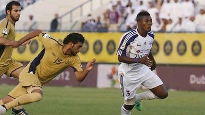 Asamoah Gyan, right, says negotiations are continuing and that he is 'thinking only of Al Ain' for the coming Pro League season.